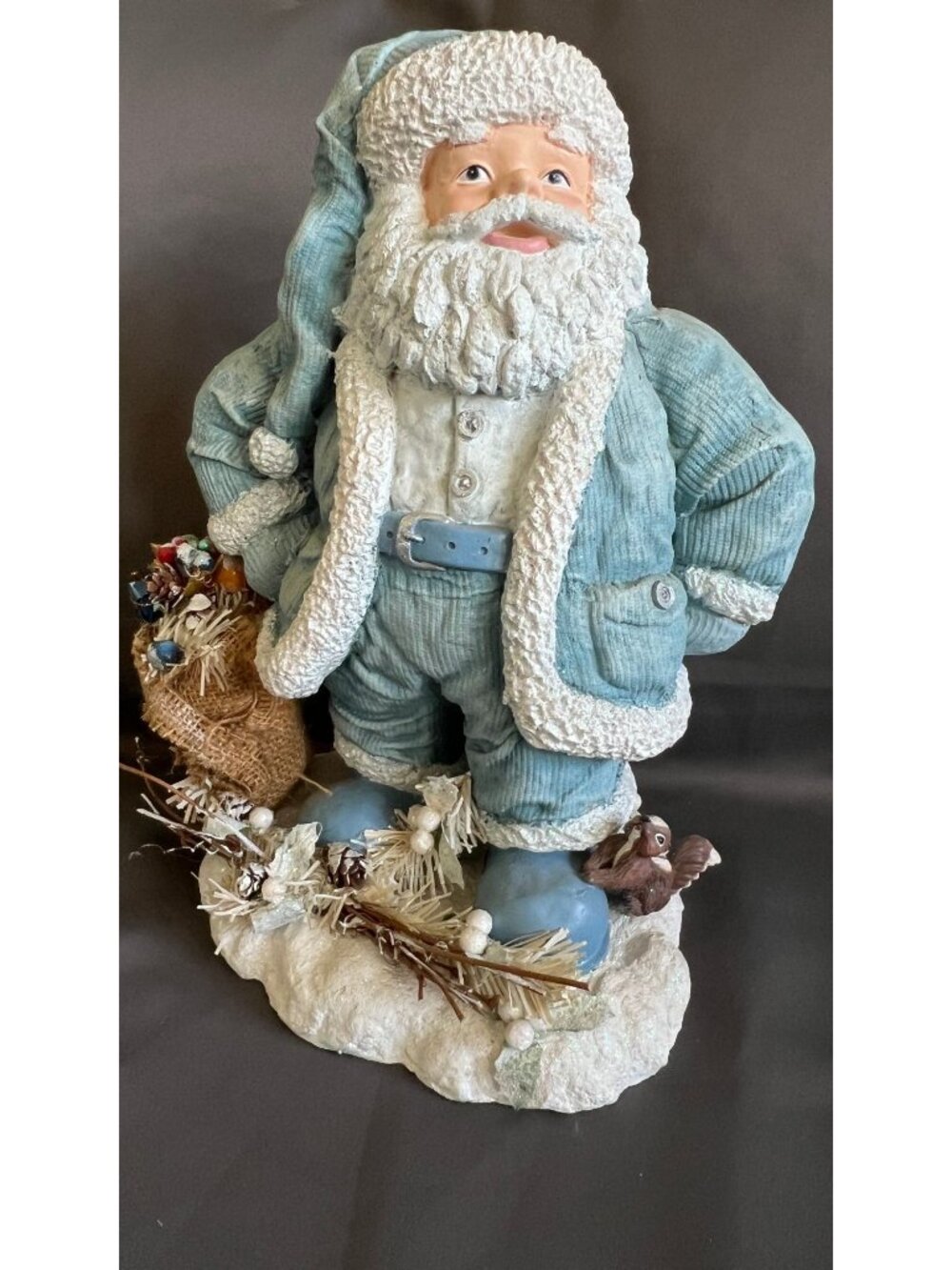 14-Inch Blue Santa Figurine With Burlap Bag & Woodland Details